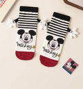 Holding hand Mickey Mouse ￼